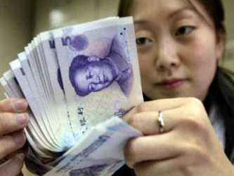 Un yuan más fuerte beneficiaría a fin de cuentas a los consumidores chinos y a los...