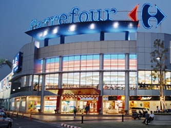 Carrefour redujo a la mitad su dividendo a 0.52 euros, por debajo de la previsión de 0.72...