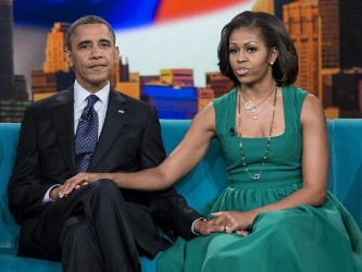 El presidentes estadounidense, Barack Obama, y su esposa, Michelle, en un descanso de la...