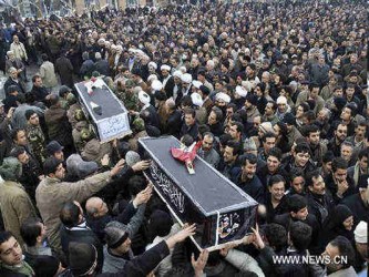 Su funeral en Teherán convocó a miles de iraníes, seguidores del Gobierno...