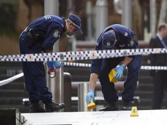 Australia está en alerta máxima después de que policías fuertemente...