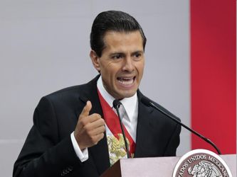 Peña Nieto mencionó que en 2014 el número de homicidios fue un 24,3 % menor al...