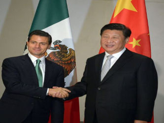 Peña Nieto y Xi mantuvieron en la noche del lunes un encuentro al margen de la cumbre del...