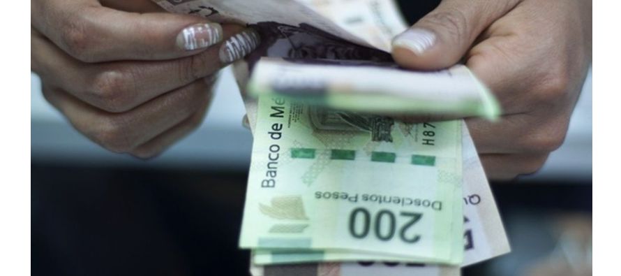 En diciembre, el Banco de México subió los tipos de interés 50 puntos base por...