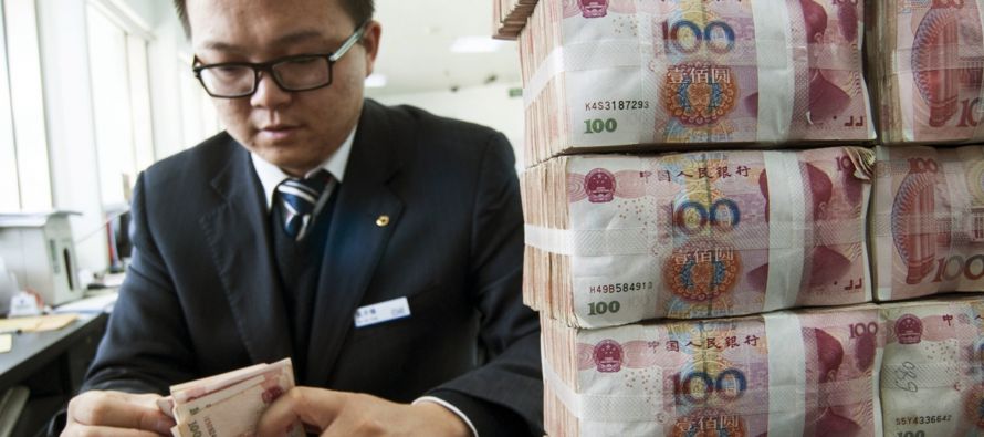 Las reservas de divisas de China cayeron en 41.000 millones de dólares en diciembre a 3,011...