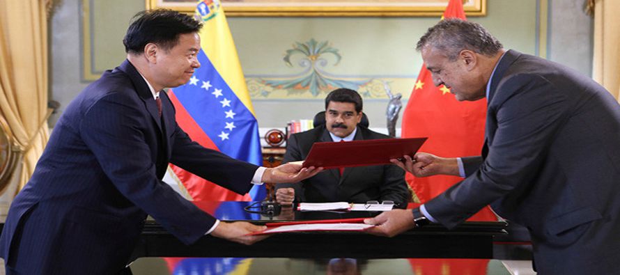 En esa reunión, los representantes de Venezuela y miembros del Banco de Desarrollo de China...
