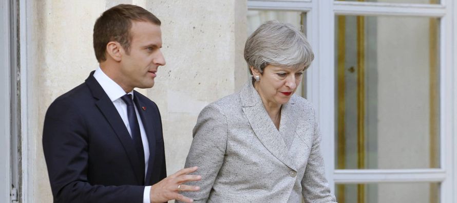 Monsieur Europa frente a Lady Brexit. El presidente triunfante frente a la primera ministra...