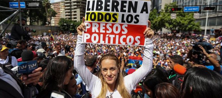 El día 100 de las protestas contra Nicolás Maduro giró en torno a la...