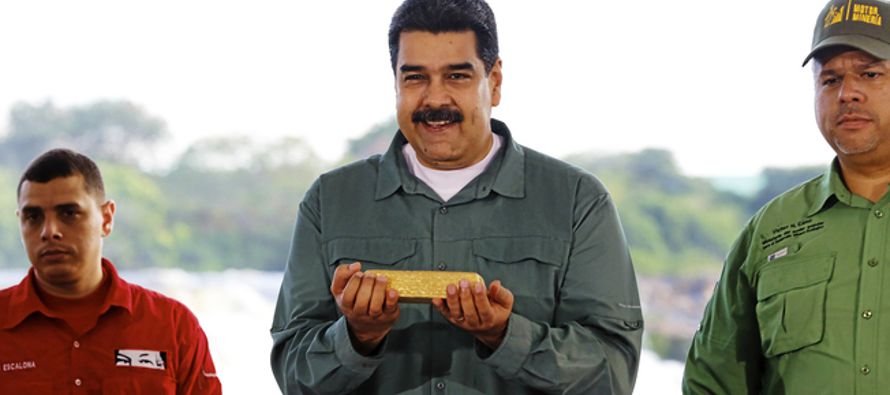 Venezuela encara hoy las terceras elecciones en cinco meses con un nuevo default parcial por...