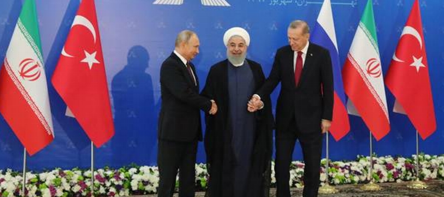 En la cumbre de Teherán, Rohani reiteró la importancia de "cooperar con el...