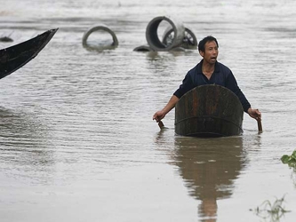 Las inundaciones al sur del río Yangtze y en la región de Guangxi afectaron a 13...