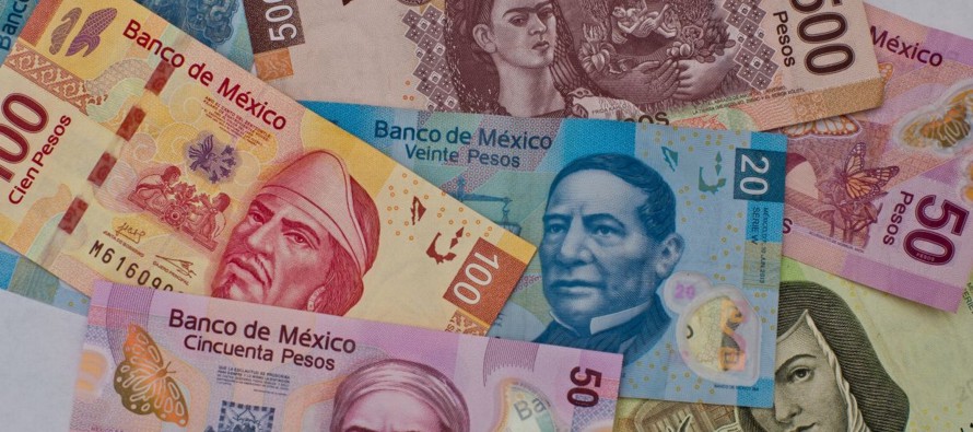 La moneda mexicana cotizaba en 18.823 unidades por dólar, con una ganancia de 0.38%, o 7.20...