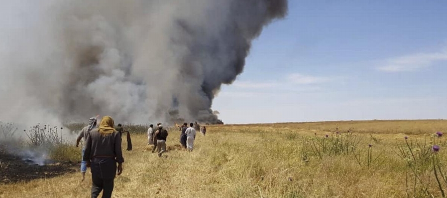Los incendios en cosechas registrados este mes en zonas de Siria e Irak se han atribuido a...