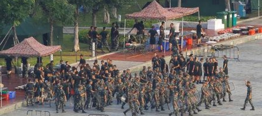 Cientos de efectivos de la Policía Armada Popular de China (PAP por sus siglas en...