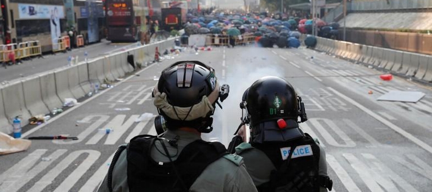 Los enfrentamientos se extendieron desde el exclusivo distrito de Causeway Bay a la zona del...