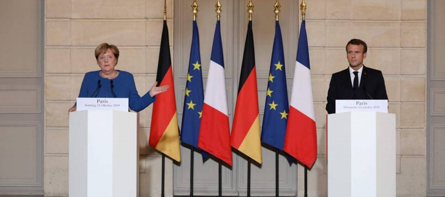 Merkel y el presidente francés, Emmanuel Macron, avisaron en París del riesgo de una...