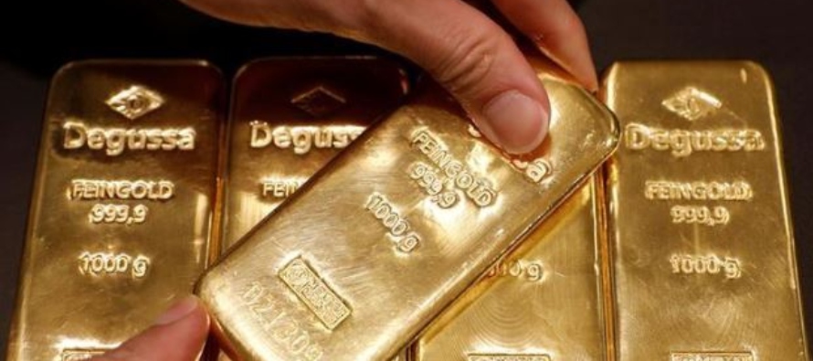En las operaciones de la tarde, el oro al contado ganó un 1,1% a 1.568,19 dólares por...