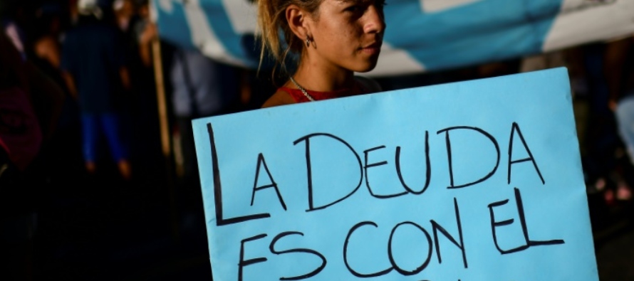 Para muchos argentinos, el FMI "ha sido siempre un protagonista de las crisis más...