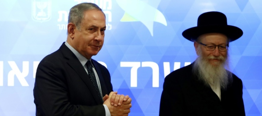 Gali Tibbon El primer ministro Benjamin Netanyahu escucha una pregunta durante una rueda de prensa...