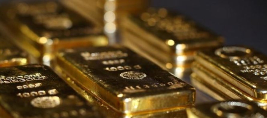 Los precios del oro al contado XAU= ganaban 18,5543 dólares, o un 0,94%, a 1.995,25...