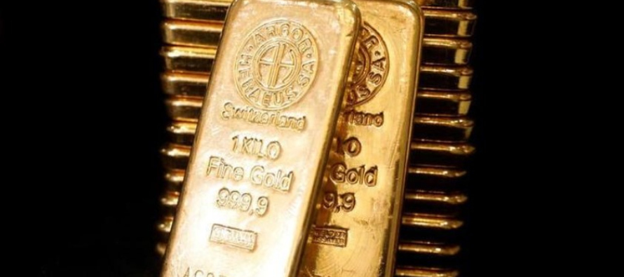 El oro al contado subía un 0,4% a 1.950,34 dólares la onza a las 1745 GMT, tras...