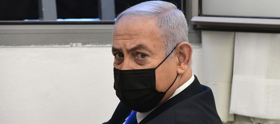 Netanyahu fue procesado el año pasado por fraude, abuso de confianza y aceptar sobornos en...