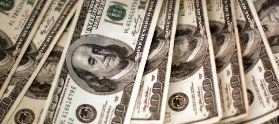 El índice dólar, un referente de su valor frente a seis grandes divisas, subía...