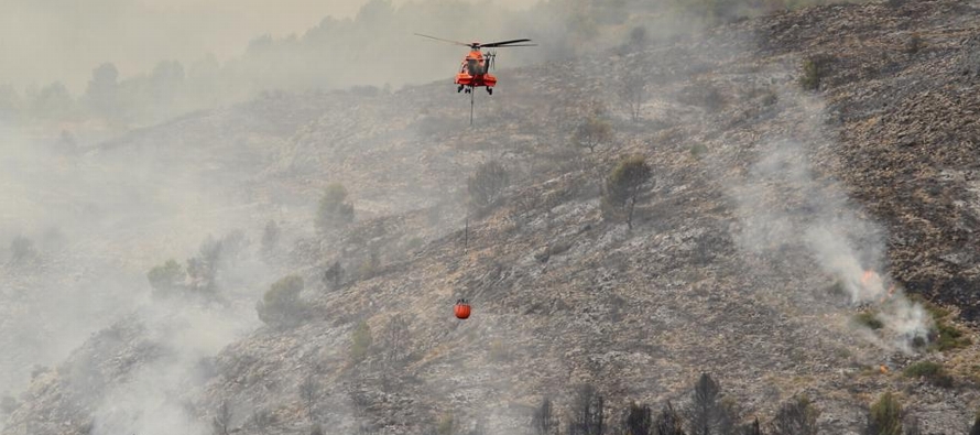 En lo que va de año han ardido en España 275,000 hectáreas (679,000 acres),...