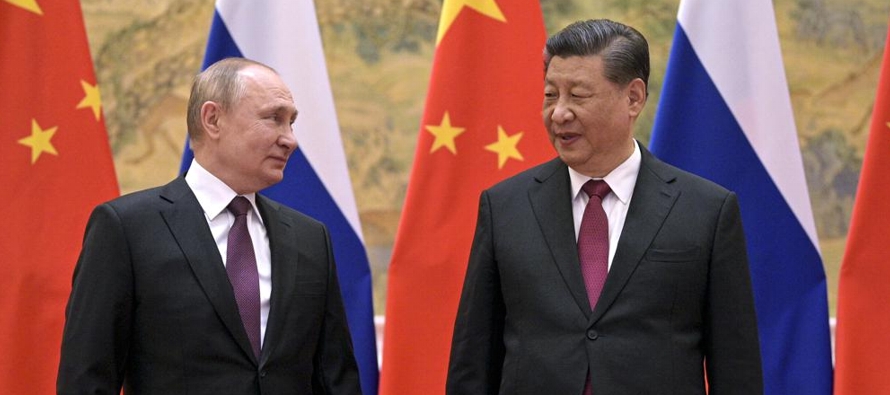 El encuentro entre el presidente ruso Vladimir Putin con su par chino Xi Jinping en Beijing...