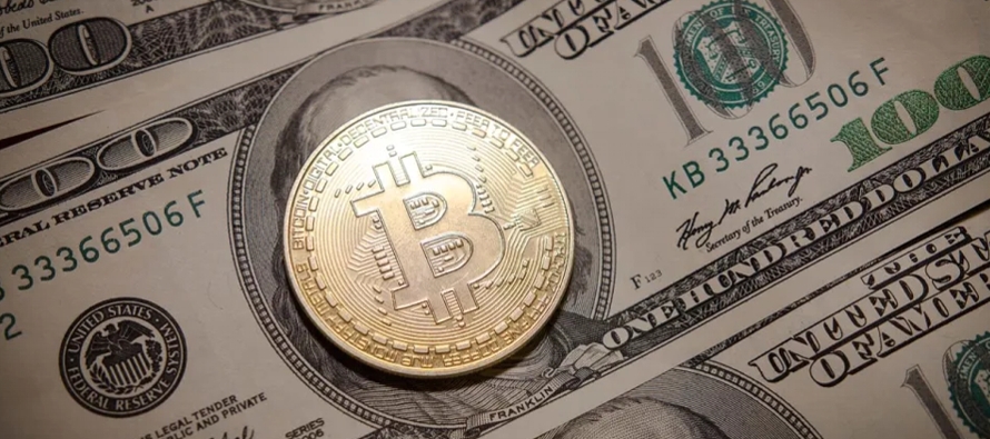 El precio de bitcoin cayó a alrededor de US$ 27,000 por bitcoin, su precio más bajo...