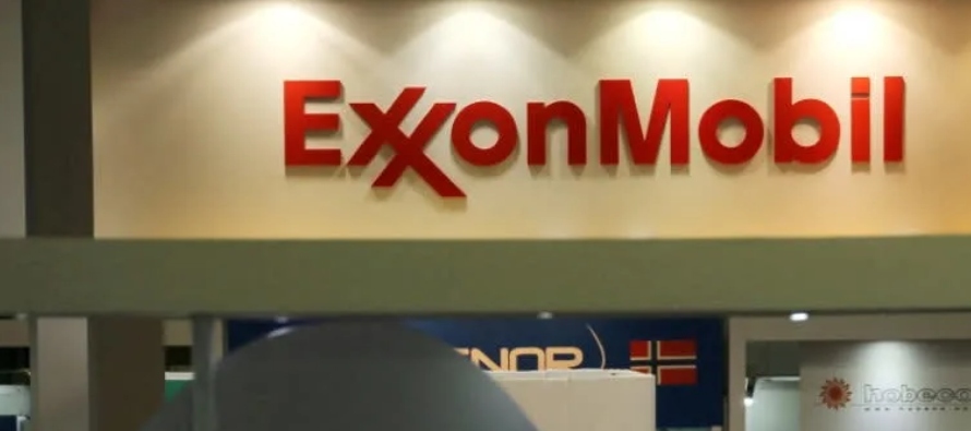 Exxon Mobil Corp señaló el viernes que las ganancias de su producción de...