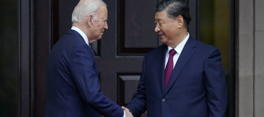 En su llamada con Xi, Biden presionó a China a hacer más para cumplir con sus...